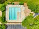 Well-maintained community pool with ample lounge chairs and a seating area at 1418 Lonan Dr, Waxhaw, NC 28173