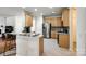Kitchen features stainless steel appliances, granite countertops, and light wood cabinets at 1418 Lonan Dr, Waxhaw, NC 28173