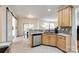 Kitchen with granite counters, stainless steel appliances, and a dining area view at 1418 Lonan Dr, Waxhaw, NC 28173