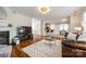 Spacious living room with open layout, hardwood floors, and modern decor at 1418 Lonan Dr, Waxhaw, NC 28173