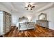 Main bedroom boasts hardwood floors, a tray ceiling, and ample closet space at 1418 Lonan Dr, Waxhaw, NC 28173