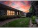 Inviting backyard featuring a well-manicured lawn and lush landscaping, perfect for outdoor relaxation at 142 Aztec Cir, Mooresville, NC 28117