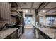 Well-appointed kitchen featuring granite countertops, stainless steel appliances, and ample cabinet space at 142 Aztec Cir, Mooresville, NC 28117