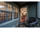 View from porch showcasing dining and kitchen areas inside the home at 142 Aztec Cir, Mooresville, NC 28117