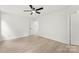 Bedroom featuring wood-look floors, ceiling fan, and natural light at 1457 Mandy Place Ct, Charlotte, NC 28216