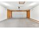 Spacious two car garage equipped with garage door opener and ample space for vehicles and storage at 1457 Mandy Place Ct, Charlotte, NC 28216