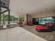 Enjoy the covered patio with outdoor seating and stunning lake views, perfect for relaxing or entertaining at 1579 Sunset Pointe Dr, Salisbury, NC 28146