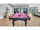 Game room with pool table and easy access to the outdoor entertainment space at 1579 Sunset Pointe Dr, Salisbury, NC 28146