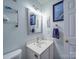 This cozy bathroom features a sink and mirror, with a neutral paint at 1715 Colin Creek Ln, Charlotte, NC 28214