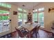 Bright dining area with views of the deck and backyard at 1715 Colin Creek Ln, Charlotte, NC 28214