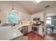 Bright kitchen with stainless steel appliances, white cabinetry, and modern countertops at 1715 Colin Creek Ln, Charlotte, NC 28214