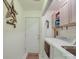 Functional laundry room with modern washer and dryer, storage cabinets, and decorative wall accents at 1715 Colin Creek Ln, Charlotte, NC 28214