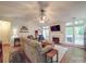 Spacious living room with a fireplace, large windows, and vaulted ceilings at 1715 Colin Creek Ln, Charlotte, NC 28214