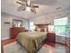 Beautiful main bedroom with wood floors, detailed wall paper, and natural light at 1715 Colin Creek Ln, Charlotte, NC 28214