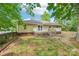 Charming home with a large backyard and a spacious wooden deck, perfect for outdoor relaxation at 185 Hunters Point Dr, Rockwell, NC 28138