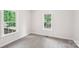 Cozy bedroom with natural light and plush neutral carpeting at 185 Hunters Point Dr, Rockwell, NC 28138