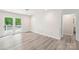 Minimalist style living room featuring neutral paint and sliding glass door at 185 Hunters Point Dr, Rockwell, NC 28138
