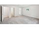 Bright main bedroom showing en suite bathroom and walk-in closet at 185 Hunters Point Dr, Rockwell, NC 28138