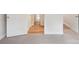 Bedroom with carpet and doors to the hallway with beautiful wood-look floors at 205 Sheffield Dr, York, SC 29745
