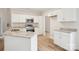 Well-lit kitchen with stainless steel appliances, granite countertops, and white cabinetry at 205 Sheffield Dr, York, SC 29745