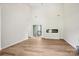 Spacious living room with an electric fireplace and sliding door access to the deck at 205 Sheffield Dr, York, SC 29745