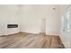 Bright living room with an electric fireplace and high ceilings at 205 Sheffield Dr, York, SC 29745