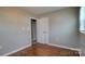 Bedroom with hardwood floors and a window, offering a bright and inviting space at 2109 Boggs St, Lincolnton, NC 28092