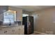 Modern kitchen features stainless steel appliances, granite countertops, and backsplash tiles at 2109 Boggs St, Lincolnton, NC 28092