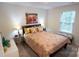 Bedroom featuring a bed, bench and bedside tables at 2220 Sussex Rd, York, SC 29745