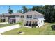 Beautiful two-story home with white siding, a landscaped lawn and a welcoming front porch at 2220 Sussex Rd, York, SC 29745