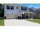 A two-story home showcases its attached garage, white siding, and well-maintained lawn at 2220 Sussex Rd, York, SC 29745