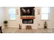 A modern fireplace with a decorative mantel creates a cozy atmosphere in this living space at 2220 Sussex Rd, York, SC 29745