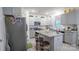 Modern kitchen with stainless steel appliances, gray cabinetry, and a granite-topped center island at 2220 Sussex Rd, York, SC 29745