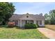 Charming single-story home with well-maintained lawn and landscaping, including flowering shrubs at 244 Whitesides Rd, Bessemer City, NC 28016