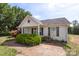 Quaint home with well-manicured lawn and garden showcasing simple curb appeal and mature landscaping at 244 Whitesides Rd, Bessemer City, NC 28016