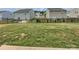 A large, well-maintained lawn and black metal fence create a private backyard setting at 250 Marinna Joy Cir, Rockwell, NC 28138