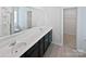 Bright bathroom with a double vanity, modern fixtures, and a walk-in shower at 250 Marinna Joy Cir, Rockwell, NC 28138