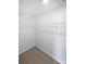 Walk-in closet with wire shelving and neutral carpet at 250 Marinna Joy Cir, Rockwell, NC 28138