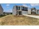 Attractive two-story home with a two-car garage and well-maintained front yard at 250 Marinna Joy Cir, Rockwell, NC 28138