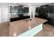This modern kitchen has stainless appliances, granite countertops, and dark cabinets at 250 Marinna Joy Cir, Rockwell, NC 28138