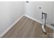 The laundry room features wood flooring and utility connections at 250 Marinna Joy Cir, Rockwell, NC 28138