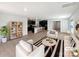 Spacious living room with modern decor, open floor plan, and access to the kitchen at 250 Marinna Joy Cir, Rockwell, NC 28138
