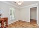 Inviting bedroom with natural light, hardwood floors, and neutral paint at 2506 Breuster Dr, Charlotte, NC 28210