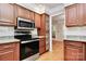 Well-lit kitchen features stainless steel appliances and granite countertops at 2506 Breuster Dr, Charlotte, NC 28210