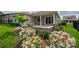 A backyard patio with a stone fire pit and sliding doors at 286 Hemlock Bluff Ct, Denver, NC 28037