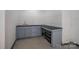 A workspace in the garage with cabinets and countertops at 286 Hemlock Bluff Ct, Denver, NC 28037