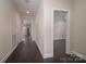 Inviting hallway with wood flooring and neutral walls, creating a warm and welcoming atmosphere at 286 Hemlock Bluff Ct, Denver, NC 28037