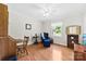 Bedroom area with blue chair, desk, and shelving for ample storage and functional space at 300 Scotland Dr, Kings Mountain, NC 28086