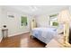 Bright bedroom featuring hardwood floors and plenty of natural light from two windows at 300 Scotland Dr, Kings Mountain, NC 28086