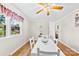 Lovely dining area with hardwood floors, white table and chair set, and natural light at 300 Scotland Dr, Kings Mountain, NC 28086